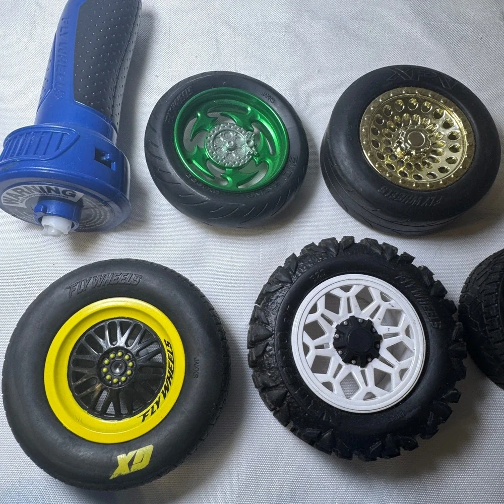 Jakks Pacific Fly Wheels Launcher Lot w/ 5 Performance Stunt Tires and Rip Cord